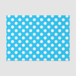 Witte polka stippen op elektrisch blauw tissuepapier