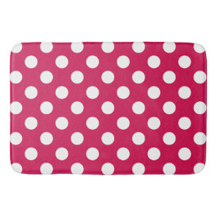 Witte polka stippen op kersrood badmat
