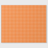 Witte polka stippen op oranje cadeaupapier (Vlak)