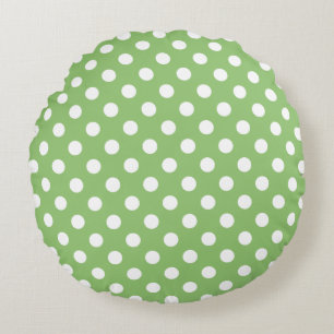 Witte polka stippen op pistachegroen rond kussen