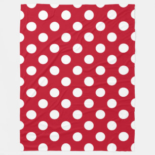 Witte polka stippen op rood fleece deken