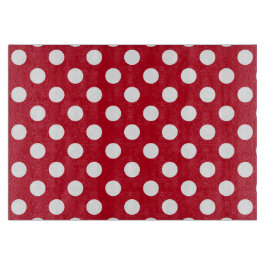 Witte polka stippen op rood snijplank
