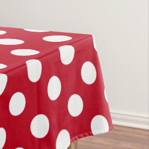 Witte polka stippen op rood tafelkleed