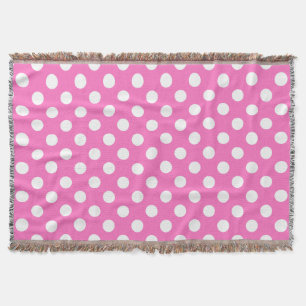 Witte polka stippen op roze deken