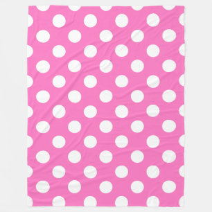 Witte polka stippen op roze fleece deken