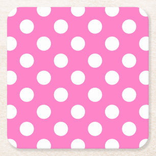 Witte polka stippen op roze kartonnen onderzetters
