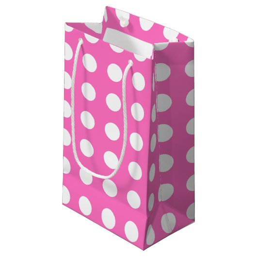 Witte polka stippen op roze klein cadeauzakje (Voorkant Gekanteld)