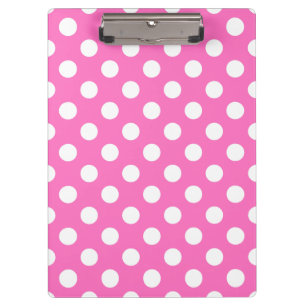 Witte polka stippen op roze klembord