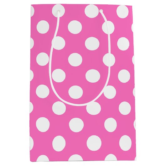 Witte polka stippen op roze medium cadeauzakje (Voorkant)