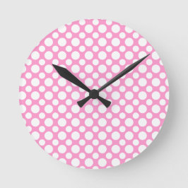 Witte polka-stippen op roze wandklok