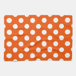 Witte polka stippen op sinaasappel theedoek