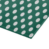 Witte polka-stippen op zonegroen snijplank (Hoek)