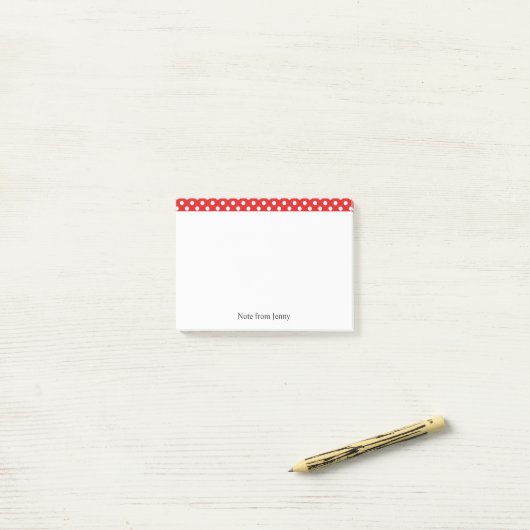 Witte poolpunten op rode aangepaste tekst post-it® notes (Op bureau)