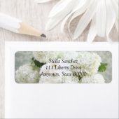 Witte ranunculus en brandkranen etiket (Insitu)