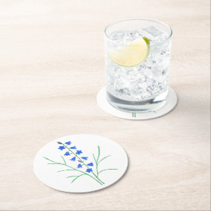 Witte ronde onderzetter met blauwe klokjes