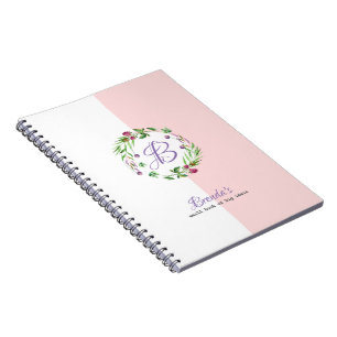 Witte & roze achtergrond met bloemenkrans notitieboek