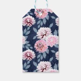 Witte, roze bloemen op donkerblauw. cadeaulabel