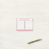 Witte roze gestreept om checkbox met lijst te doen post-it® notes (Op bureau)