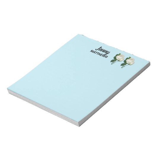 witte rozen aangepaste naam op blauw notitieblok (Linkerzijde)