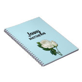 witte rozen aangepaste naam op blauw notitieboek (Rechterzijde)