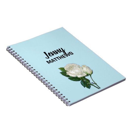 witte rozen aangepaste naam op blauw notitieboek (Rechterzijde)