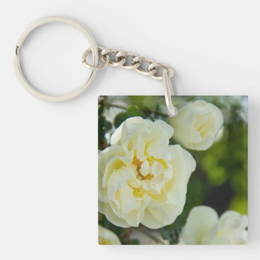 Witte rozen voor positieve uitslag sleutelhanger (voorkant)