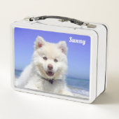 Witte Samojedische hond op lichtblauw (Achterkant)