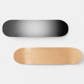 Witte schijnwerper op zwart persoonlijk skateboard (Horizontaal)