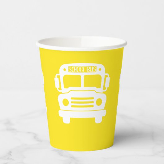 Witte schoolbus op gele achtergrond papieren bekers (Links)