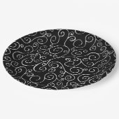 Witte scrollende curven op zwart papieren bordje (Gekanteld)