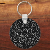 Witte scrollende curven op zwart sleutelhanger (Voorkant)