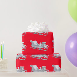 Witte Sleigh op rood inpakpapier