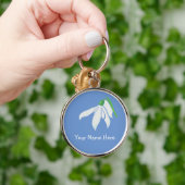 witte sneeuwdruppelbloem op blauw sleutelhanger (Hand)