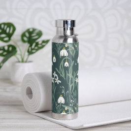 Witte sneeuwklokjes bloemen op salie waterfles