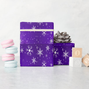 Witte sneeuwvlokken en blauw achtergrondpapier cadeaupapier