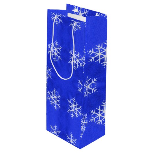 Witte sneeuwvlokken helderblauwe achtergrond wijn cadeautas (Voorkant Gekanteld)