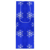Witte sneeuwvlokken helderblauwe achtergrond wijn cadeautas (Voorkant)