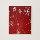 Witte sneeuwvlokken met rode achtergrond legpuzzel (Verticaal)