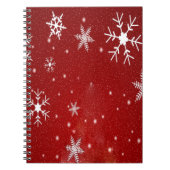 Witte sneeuwvlokken met rode achtergrond notitieboek (Voorkant)