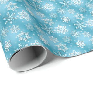 witte sneeuwvlokken op aqua cadeaupapier