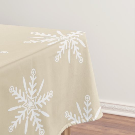 Witte sneeuwvlokken op beige Xmas tablecloth. Tafelkleed (Voorbeeld)