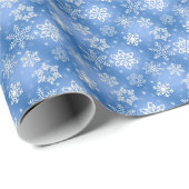 witte sneeuwvlokken op blauw cadeaupapier (Rol Hoek)