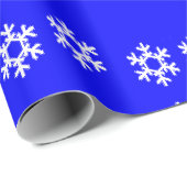 Witte sneeuwvlokken op blauw cadeaupapier (Rol Hoek)