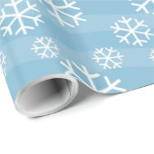 Witte sneeuwvlokken op blauw cadeaupapier (Rol Hoek)