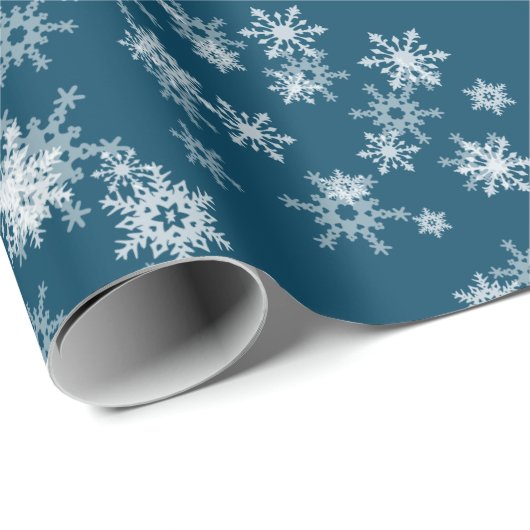 Witte sneeuwvlokken op blauw cadeaupapier (Rol Hoek)