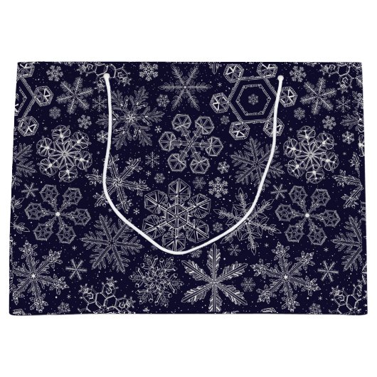 Witte sneeuwvlokken op blauw groot cadeauzakje (Voorkant)