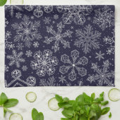 Witte sneeuwvlokken op blauw theedoek (Gevouwen)