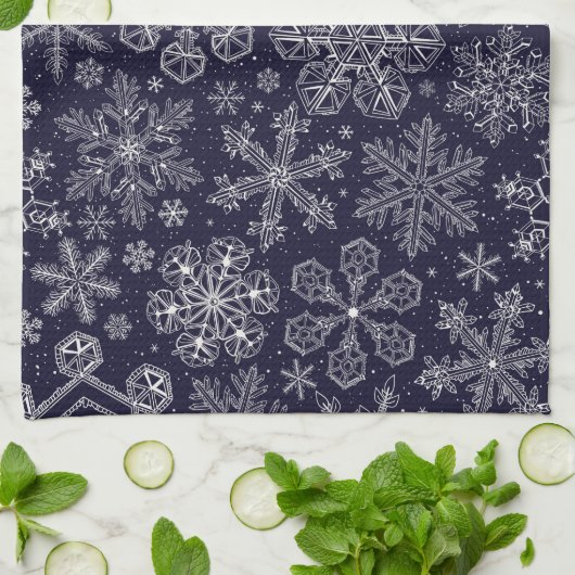 Witte sneeuwvlokken op blauw theedoek (Gevouwen)