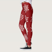 Witte sneeuwvlokken op de Rode Winterfeestdag Leggings (Links)