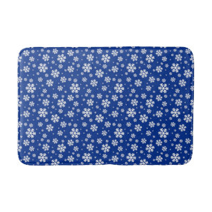 Witte sneeuwvlokken op donkerblauw winterpatroon badmat